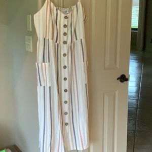 Beige stripe denim look sun dress with arm straps.